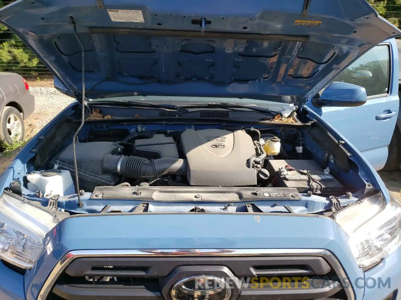 7 Photograph of a damaged car 5TFSZ5AN4KX169468 TOYOTA TACOMA 2019