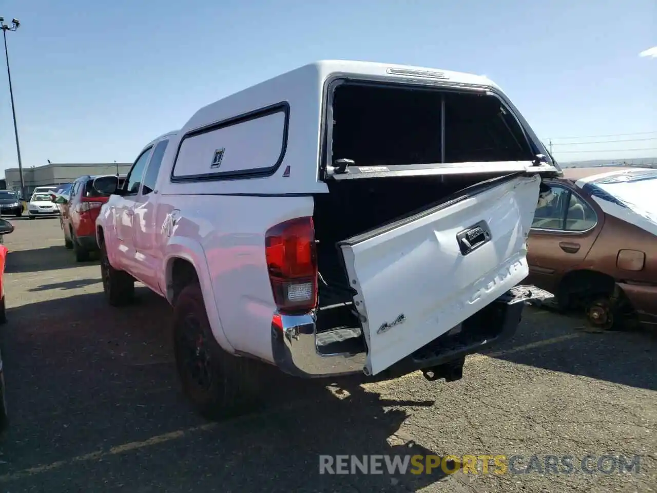 3 Photograph of a damaged car 5TFSZ5AN4KX181765 TOYOTA TACOMA 2019