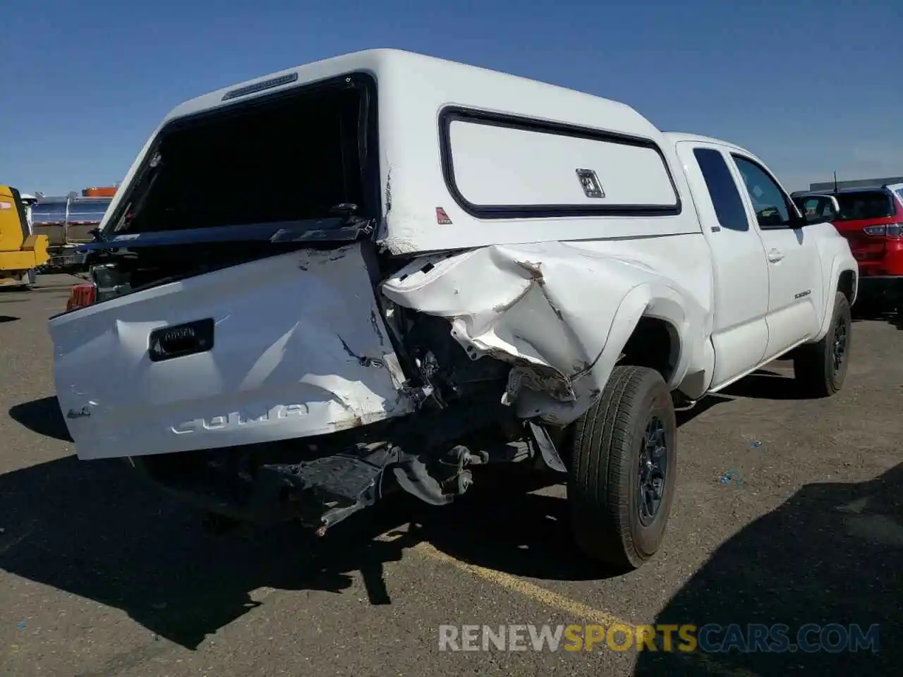 4 Photograph of a damaged car 5TFSZ5AN4KX181765 TOYOTA TACOMA 2019