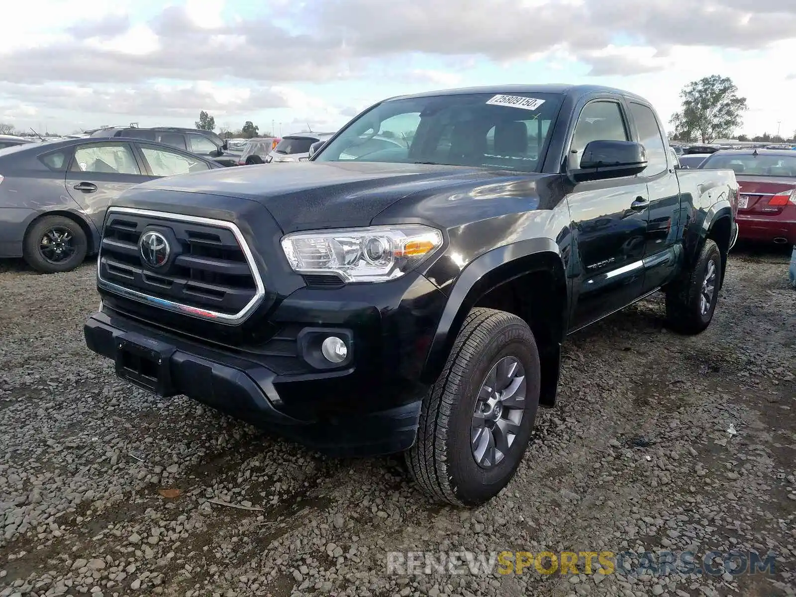 2 Photograph of a damaged car 5TFSZ5AN4KX185010 TOYOTA TACOMA 2019