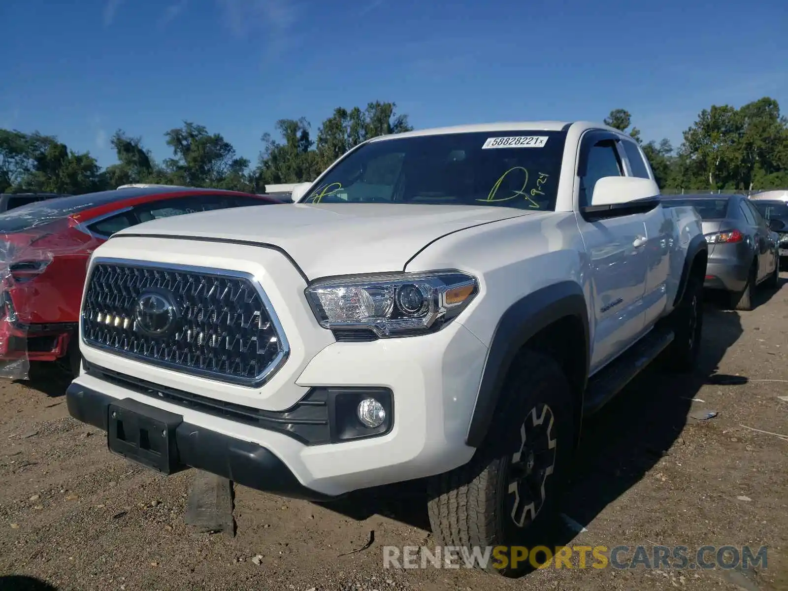 2 Photograph of a damaged car 5TFSZ5AN4KX189039 TOYOTA TACOMA 2019