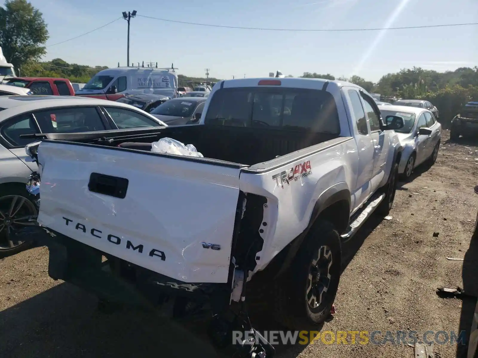 4 Photograph of a damaged car 5TFSZ5AN4KX189039 TOYOTA TACOMA 2019