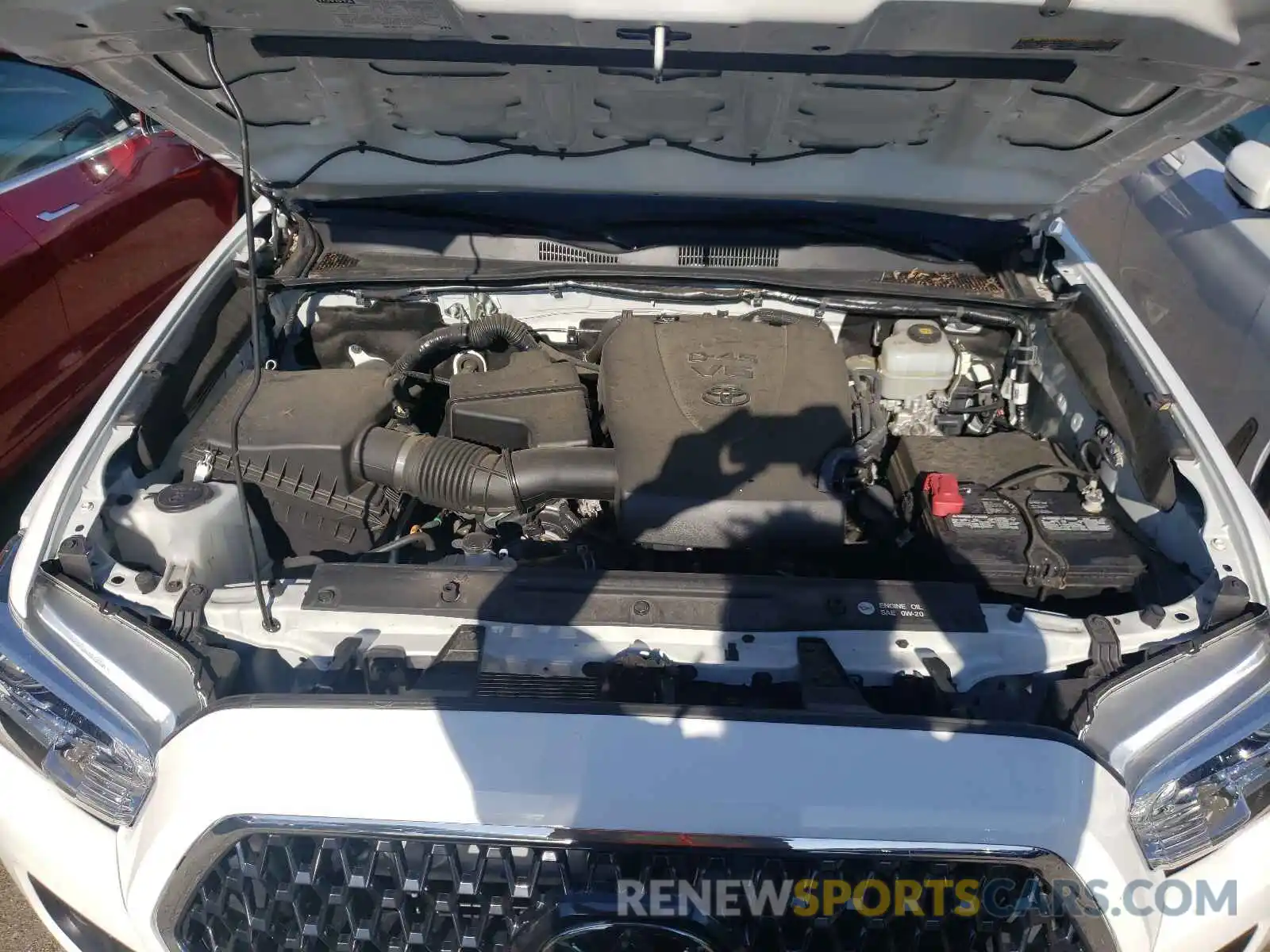 7 Photograph of a damaged car 5TFSZ5AN4KX189039 TOYOTA TACOMA 2019