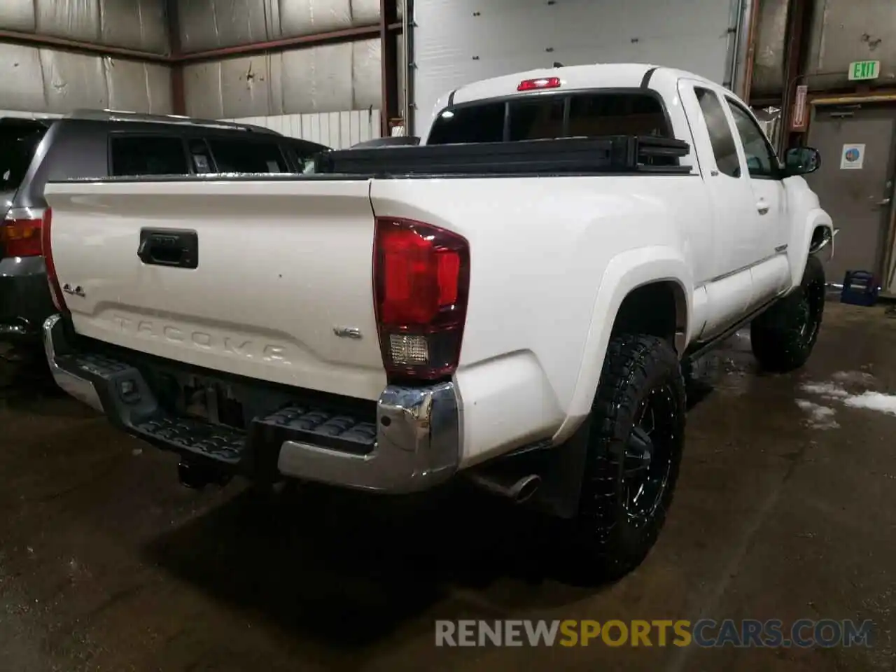 4 Photograph of a damaged car 5TFSZ5AN4KX201772 TOYOTA TACOMA 2019