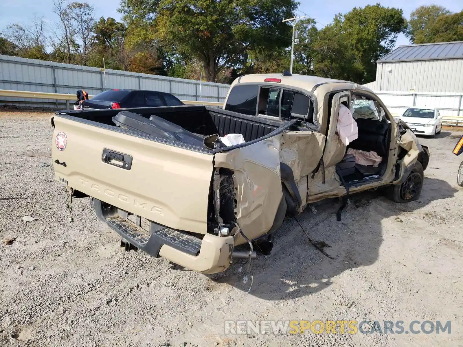 4 Photograph of a damaged car 5TFSZ5AN5KX169379 TOYOTA TACOMA 2019