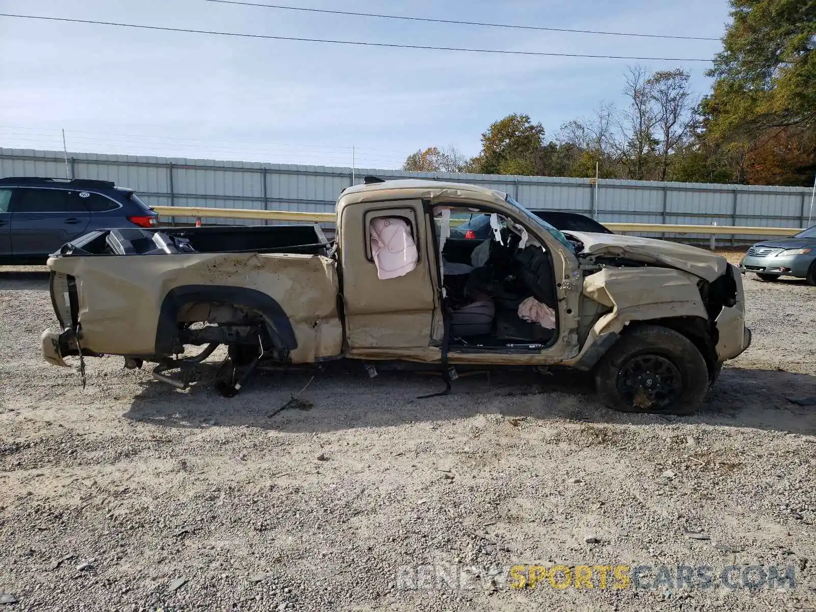 9 Photograph of a damaged car 5TFSZ5AN5KX169379 TOYOTA TACOMA 2019