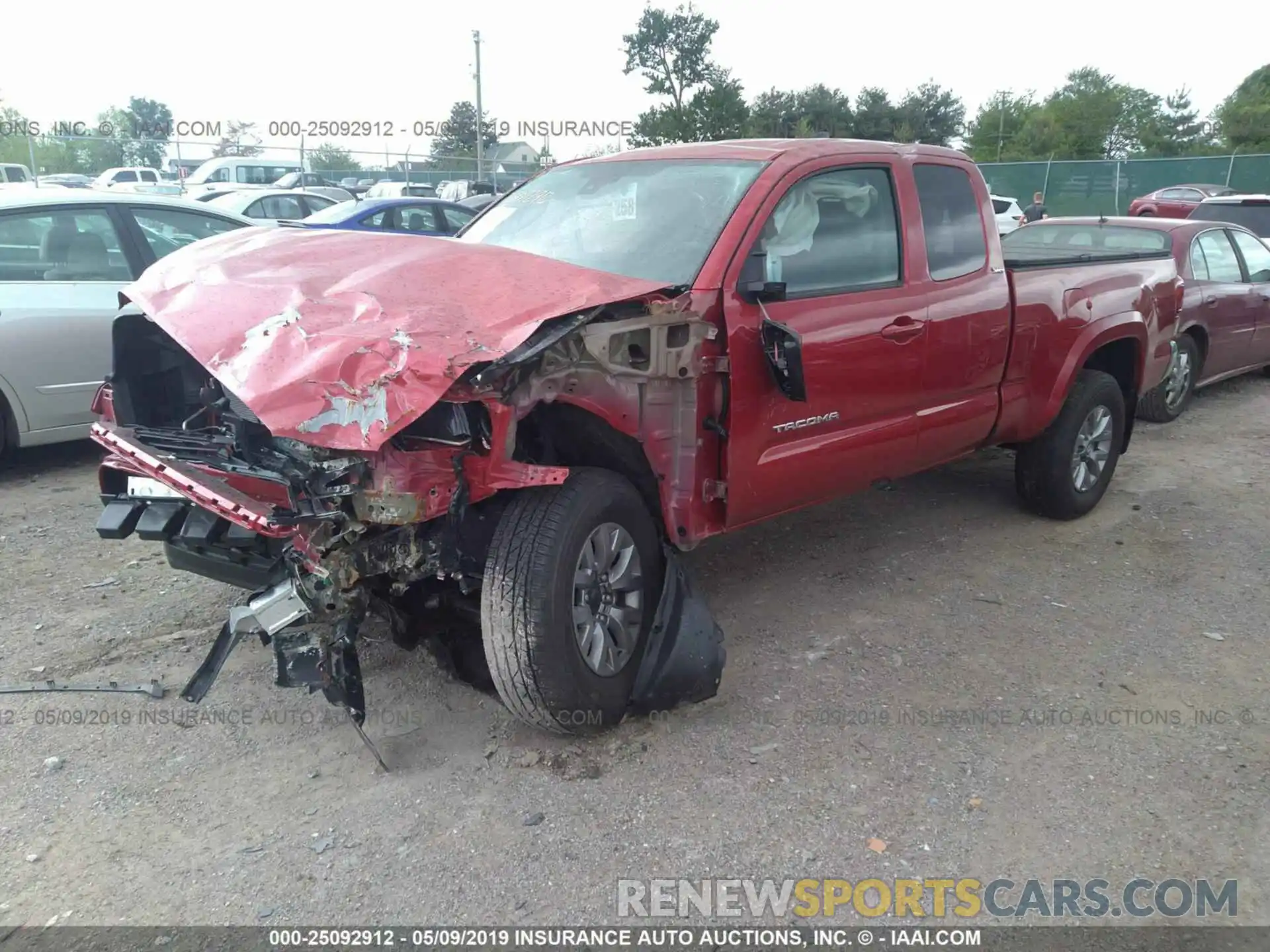 2 Photograph of a damaged car 5TFSZ5AN5KX171066 TOYOTA TACOMA 2019