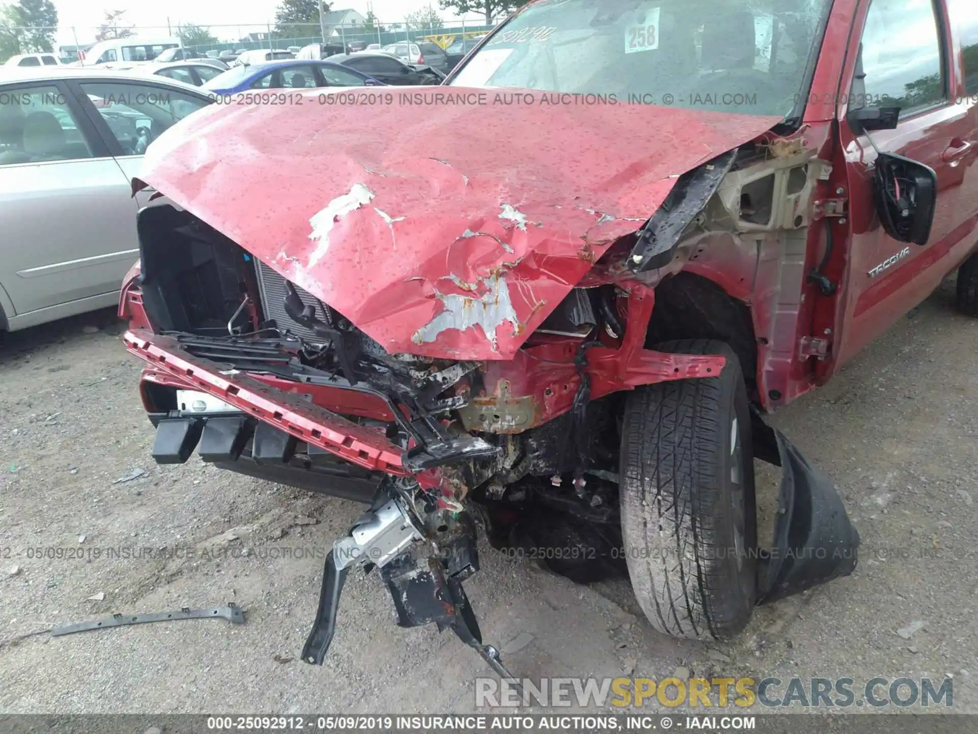 6 Photograph of a damaged car 5TFSZ5AN5KX171066 TOYOTA TACOMA 2019