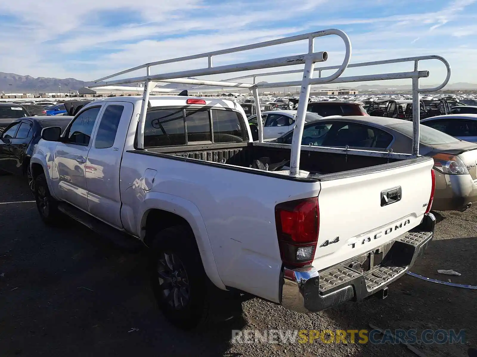 3 Photograph of a damaged car 5TFSZ5AN5KX172072 TOYOTA TACOMA 2019