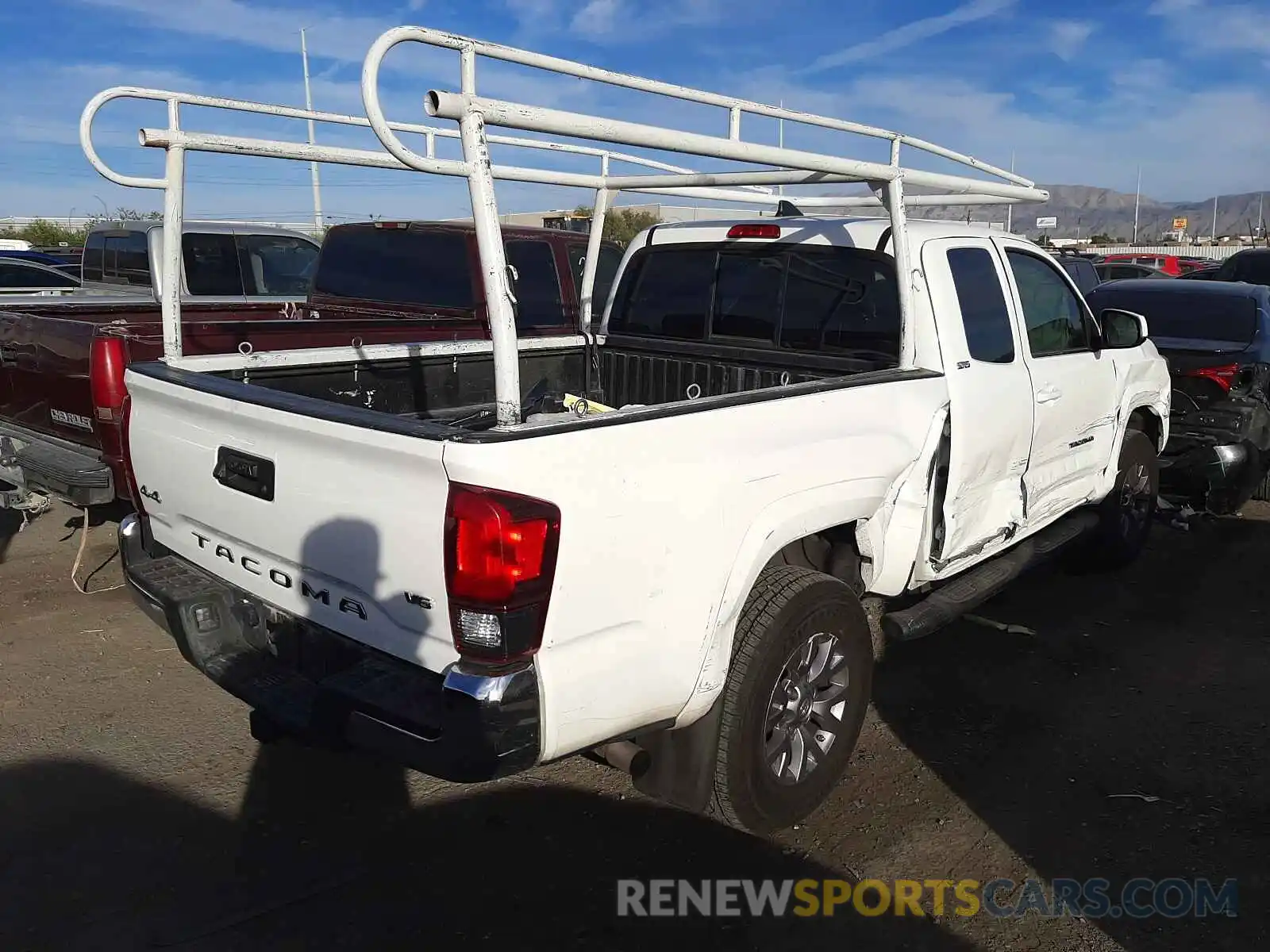 4 Photograph of a damaged car 5TFSZ5AN5KX172072 TOYOTA TACOMA 2019