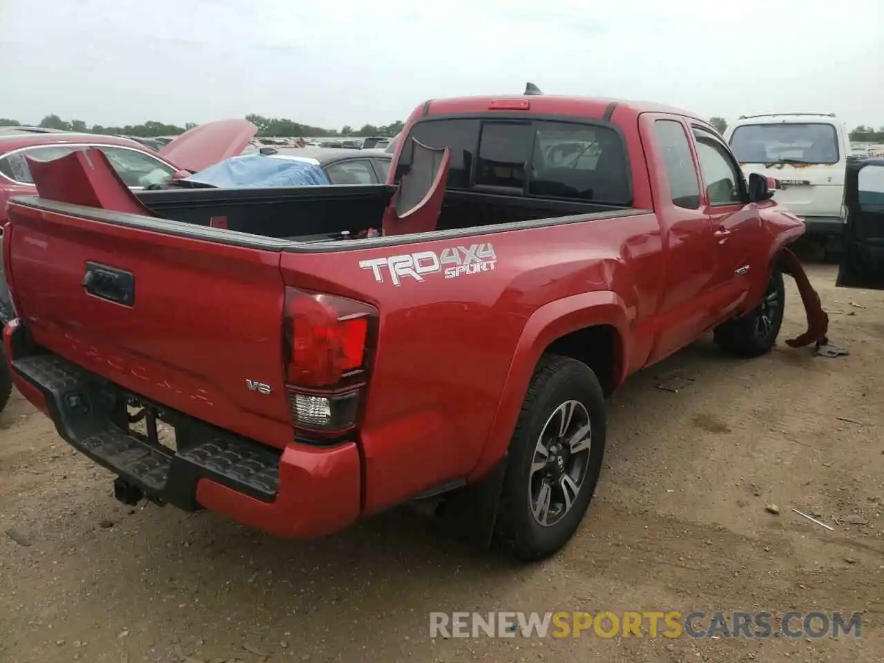 4 Photograph of a damaged car 5TFSZ5AN5KX174193 TOYOTA TACOMA 2019