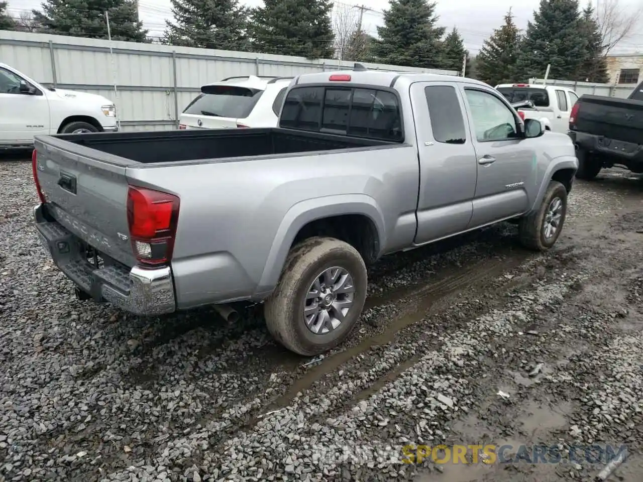 4 Photograph of a damaged car 5TFSZ5AN5KX176798 TOYOTA TACOMA 2019