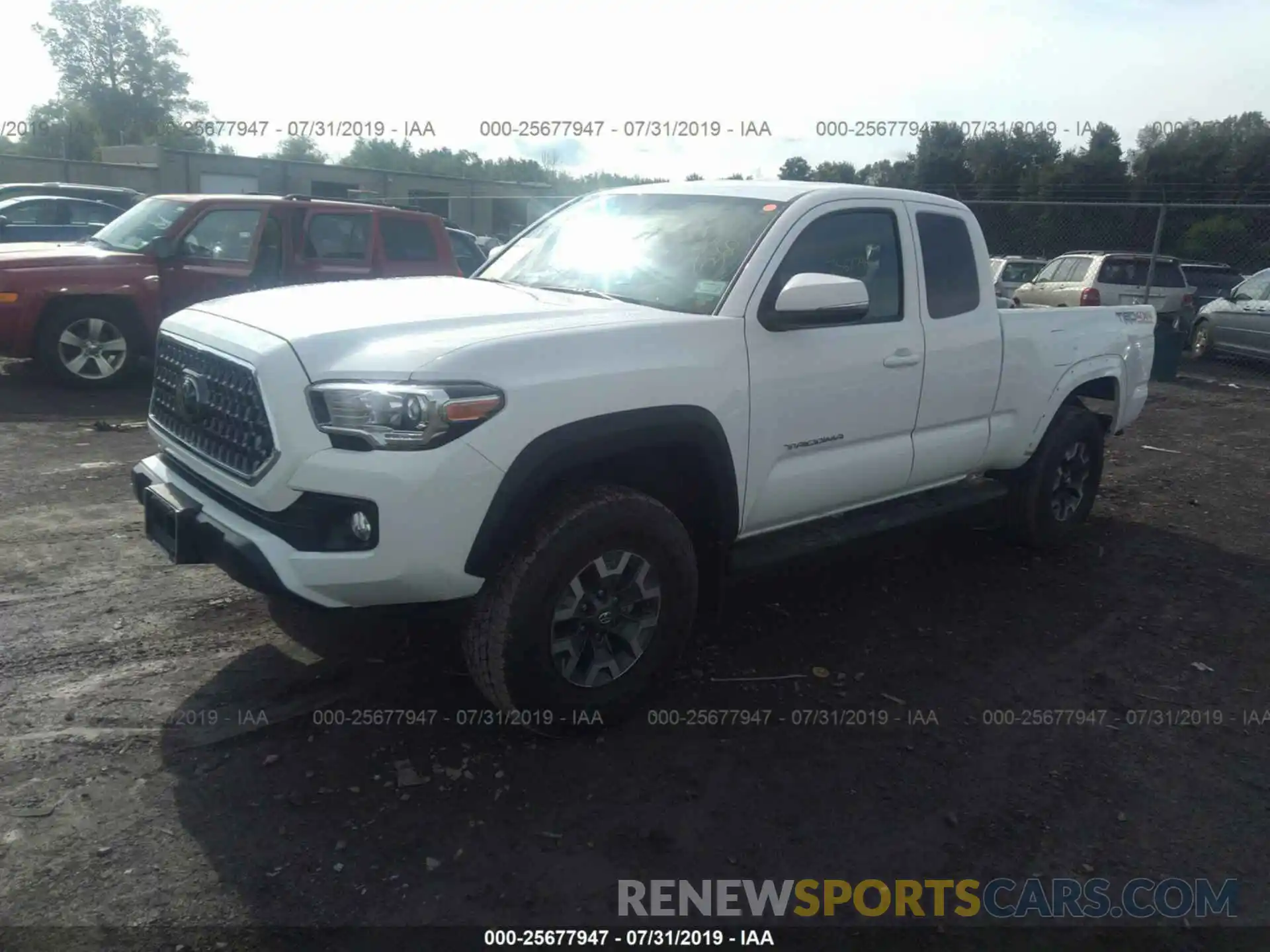 2 Photograph of a damaged car 5TFSZ5AN5KX185842 TOYOTA TACOMA 2019