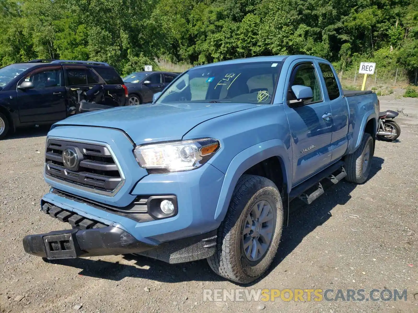 2 Photograph of a damaged car 5TFSZ5AN5KX189289 TOYOTA TACOMA 2019