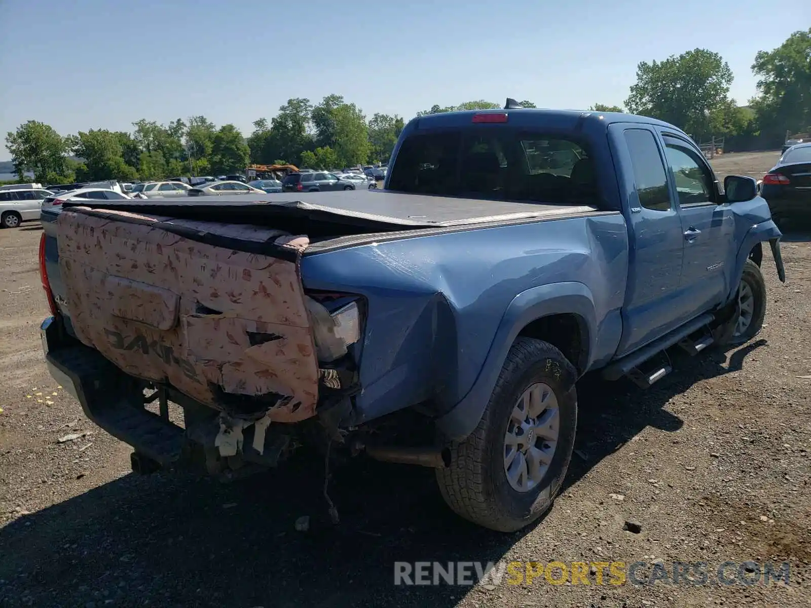 4 Photograph of a damaged car 5TFSZ5AN5KX189289 TOYOTA TACOMA 2019