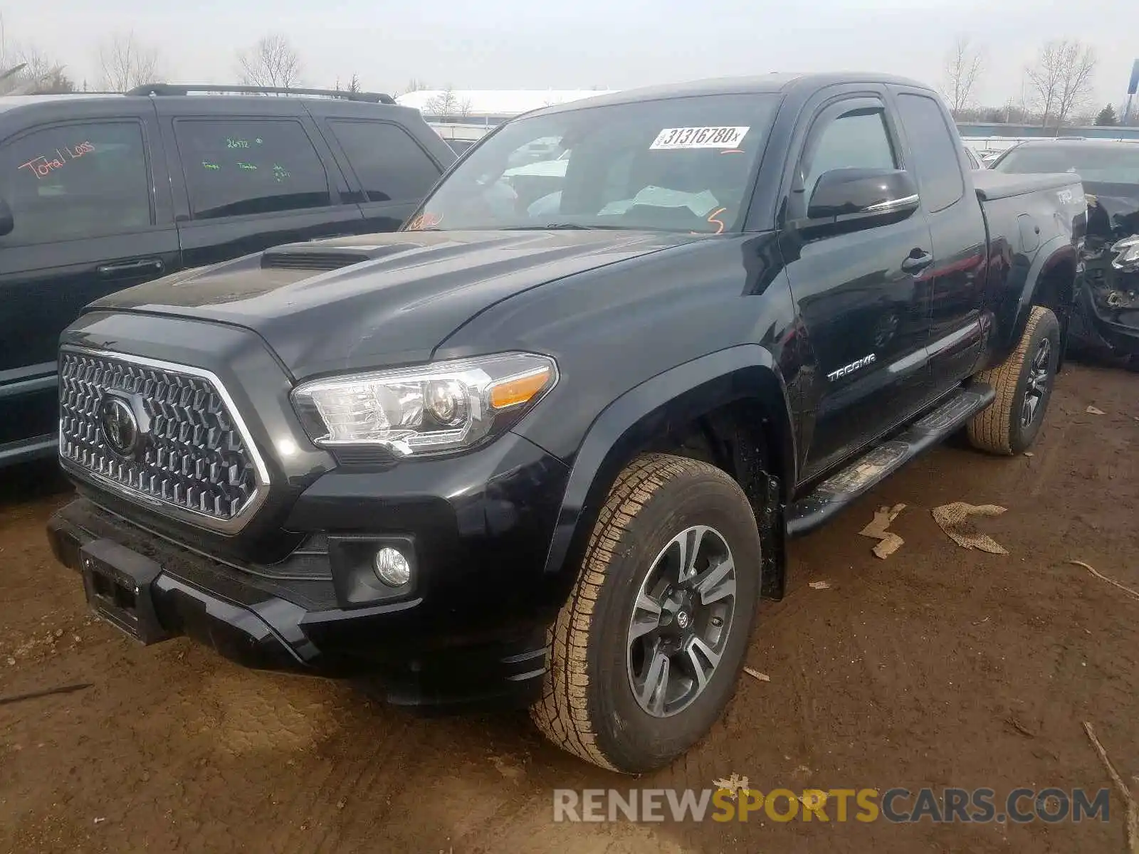 2 Photograph of a damaged car 5TFSZ5AN5KX191060 TOYOTA TACOMA 2019