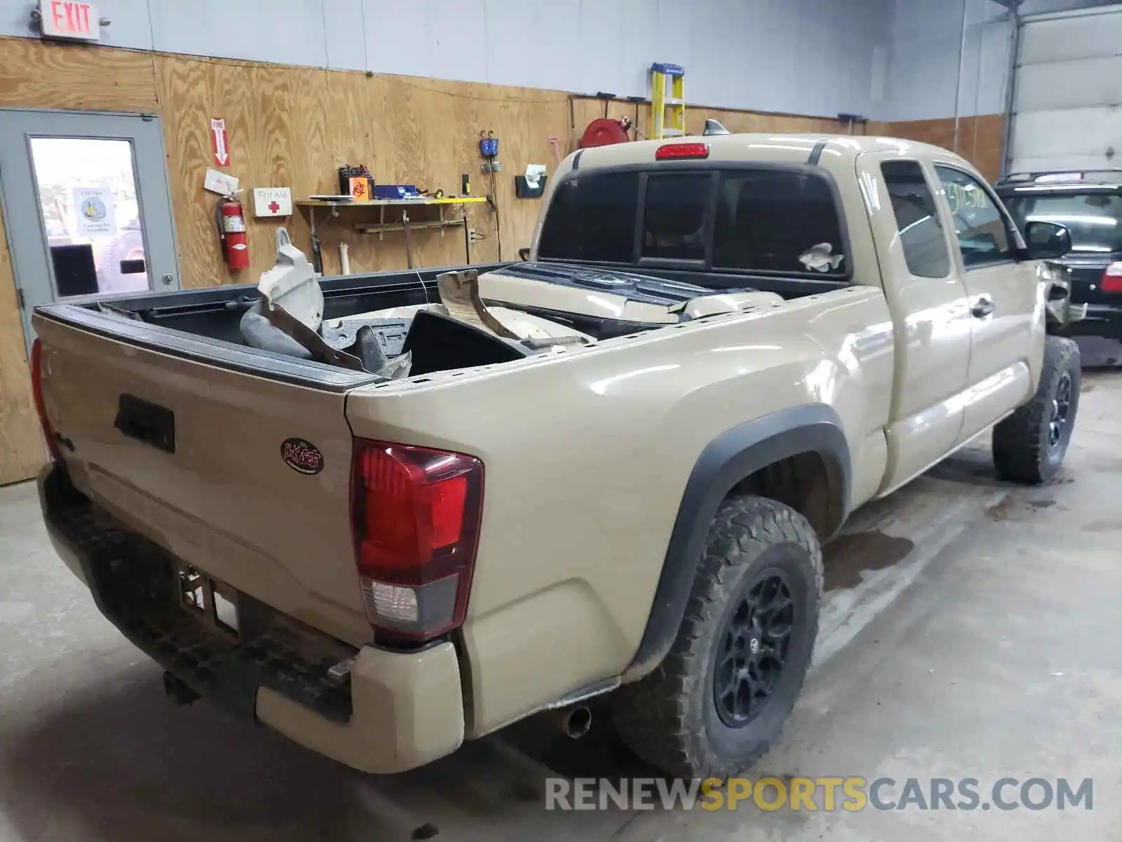 4 Photograph of a damaged car 5TFSZ5AN5KX205457 TOYOTA TACOMA 2019