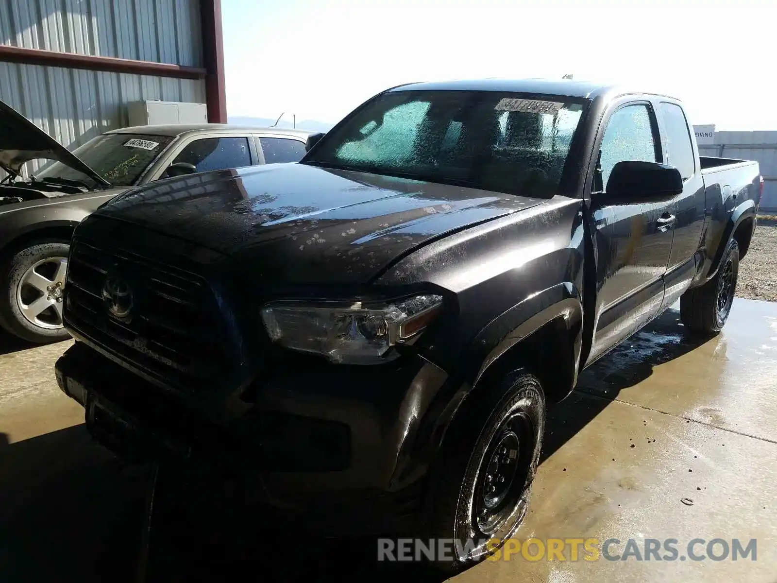 2 Photograph of a damaged car 5TFSZ5AN6KX166541 TOYOTA TACOMA 2019