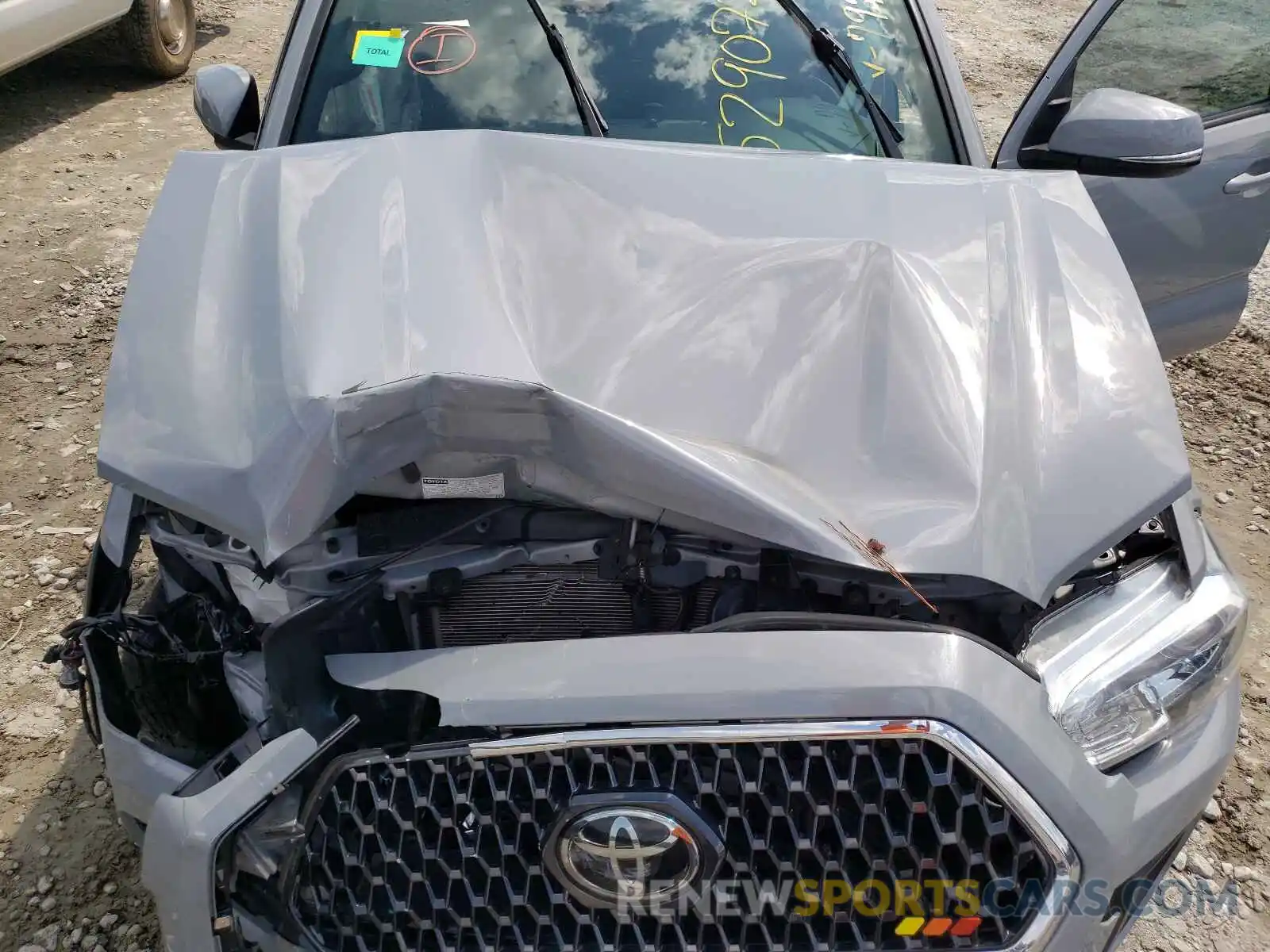 7 Photograph of a damaged car 5TFSZ5AN6KX167978 TOYOTA TACOMA 2019