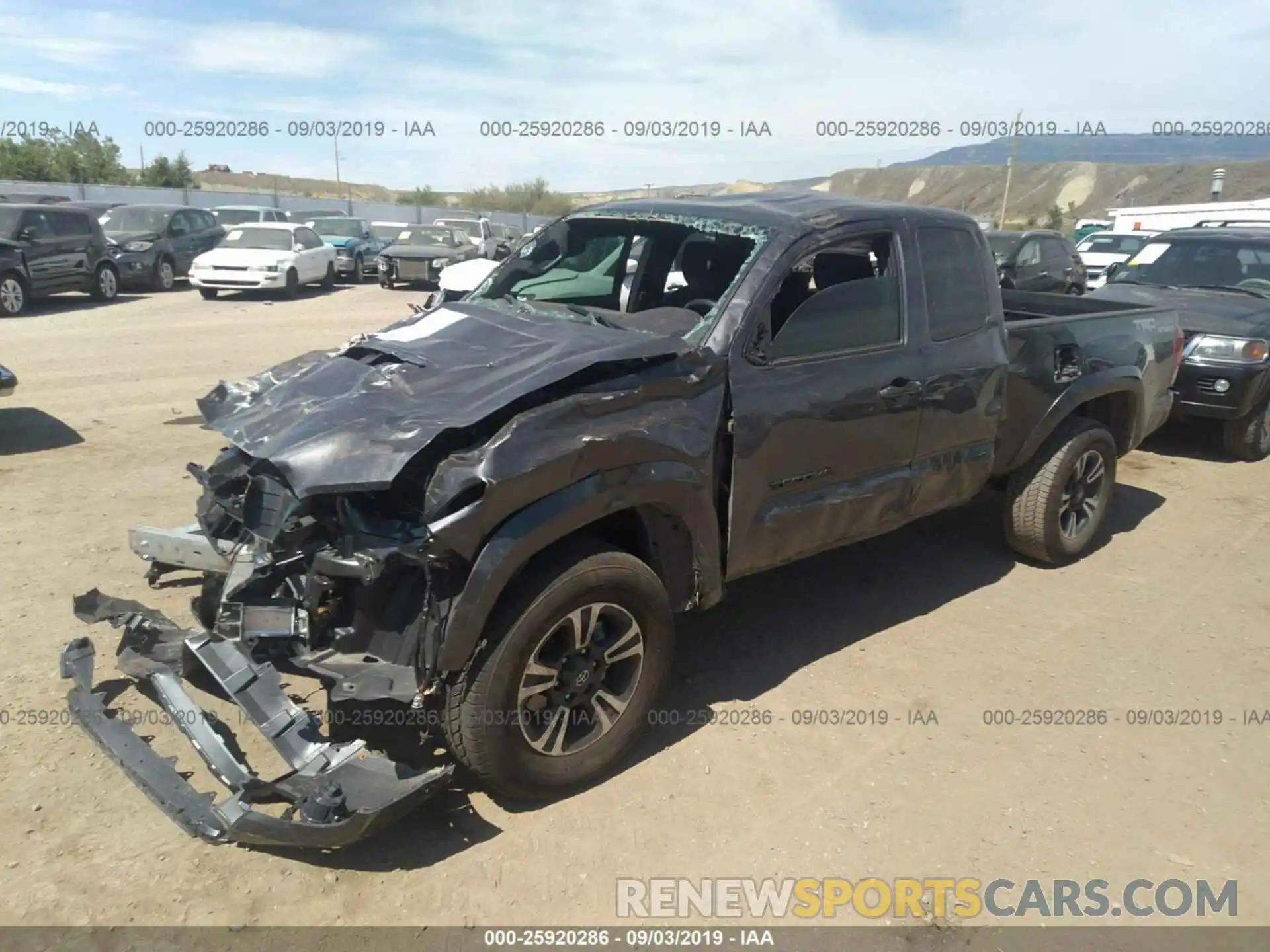 2 Photograph of a damaged car 5TFSZ5AN6KX173277 TOYOTA TACOMA 2019