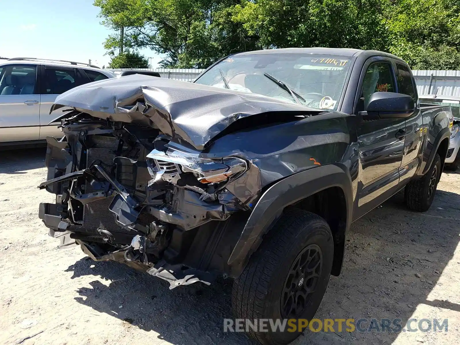 2 Photograph of a damaged car 5TFSZ5AN6KX193982 TOYOTA TACOMA 2019