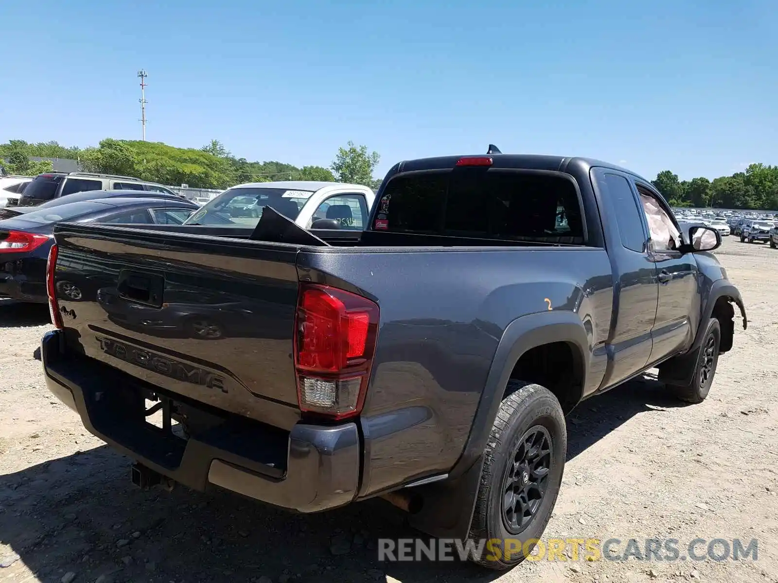 4 Photograph of a damaged car 5TFSZ5AN6KX193982 TOYOTA TACOMA 2019