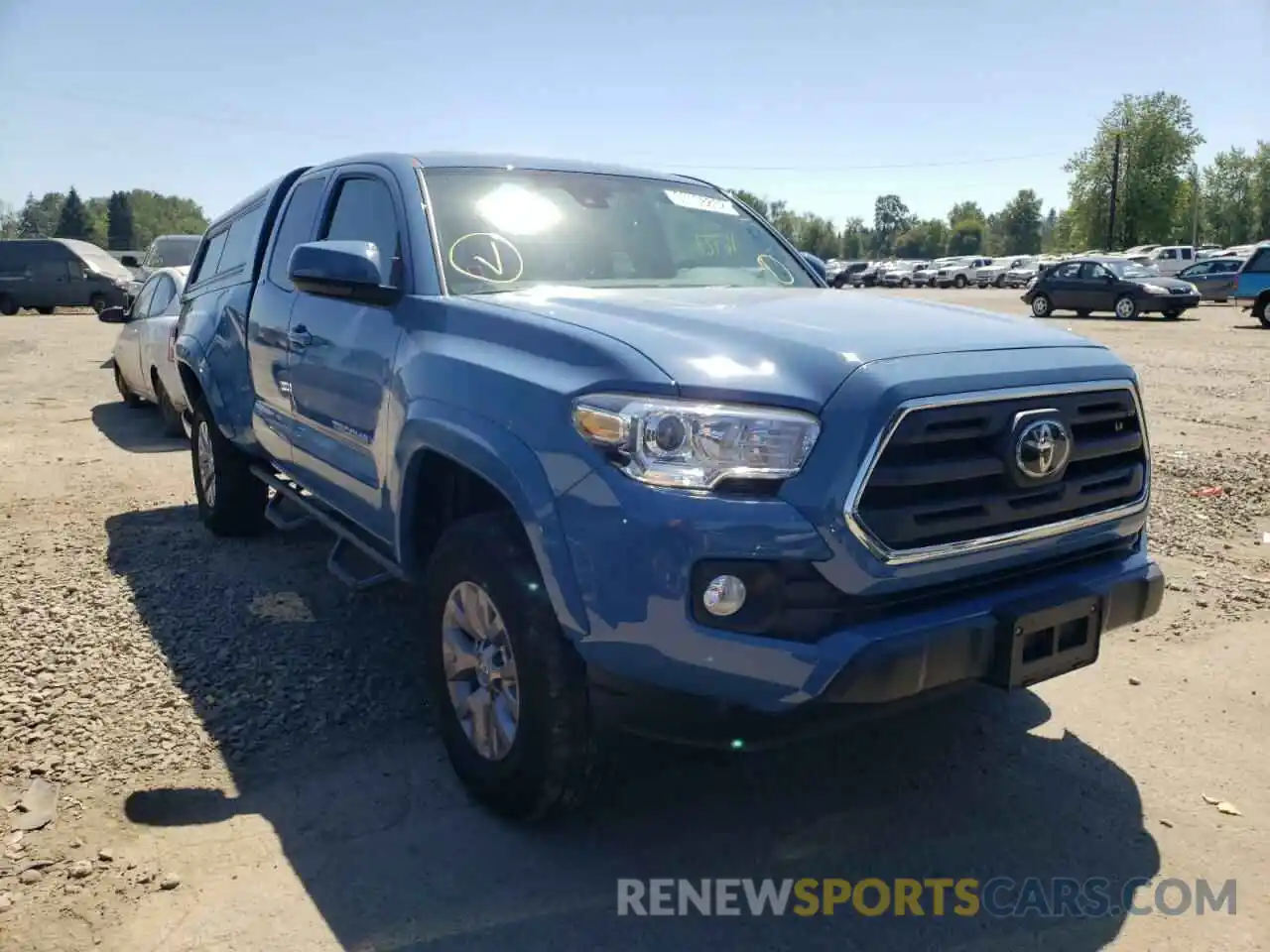 1 Photograph of a damaged car 5TFSZ5AN6KX194971 TOYOTA TACOMA 2019