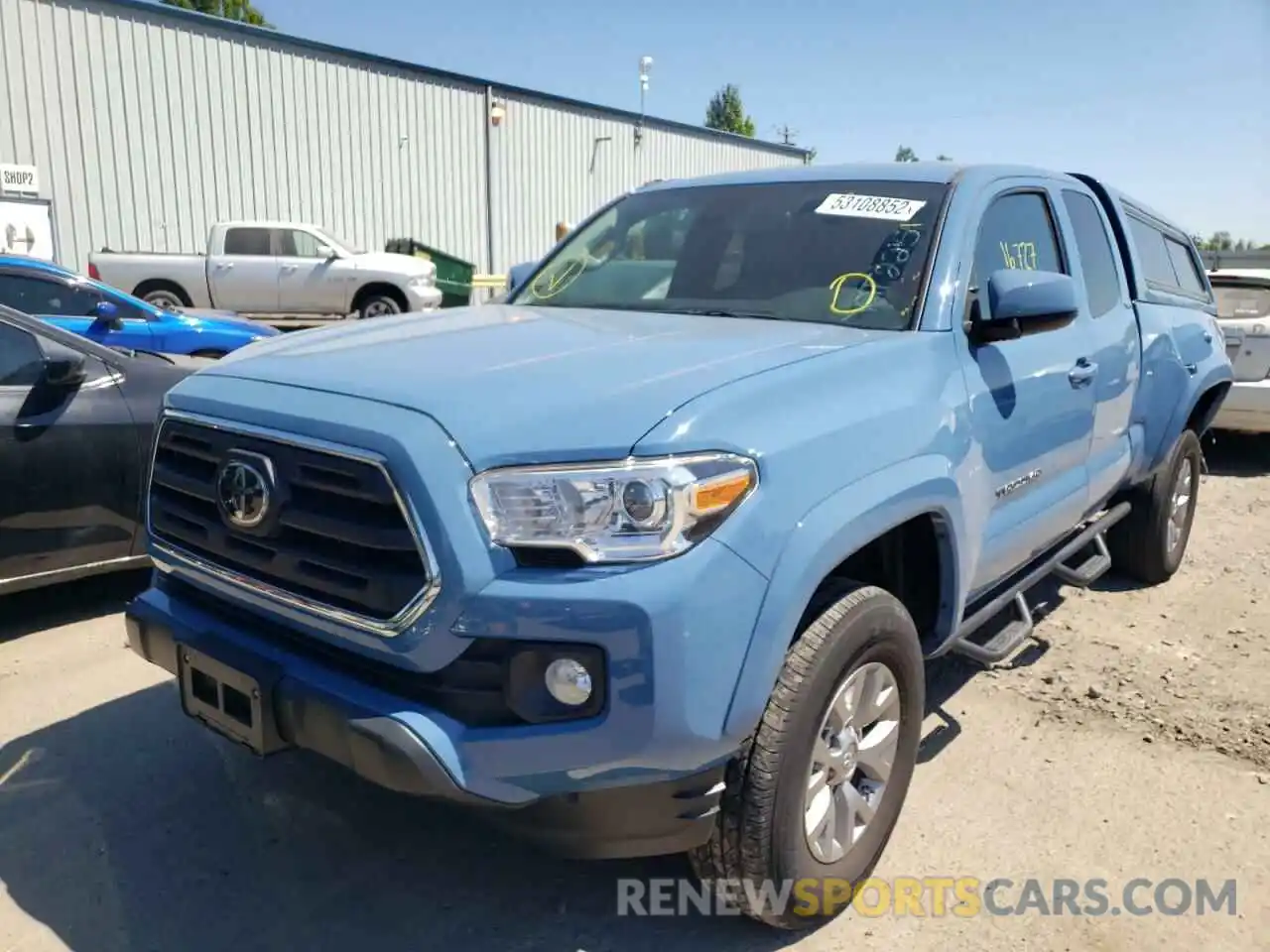 2 Photograph of a damaged car 5TFSZ5AN6KX194971 TOYOTA TACOMA 2019