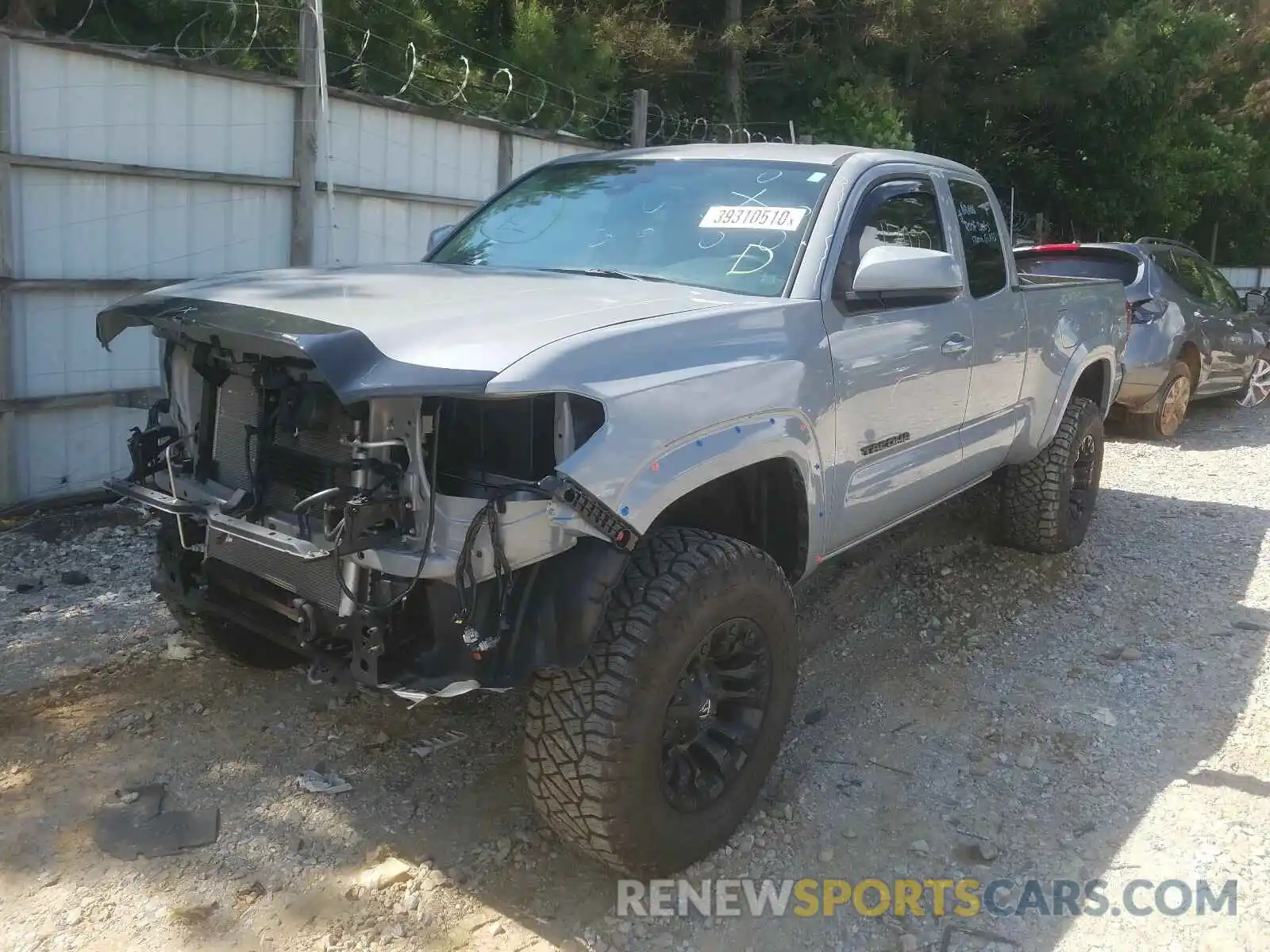 2 Photograph of a damaged car 5TFSZ5AN7KX170940 TOYOTA TACOMA 2019