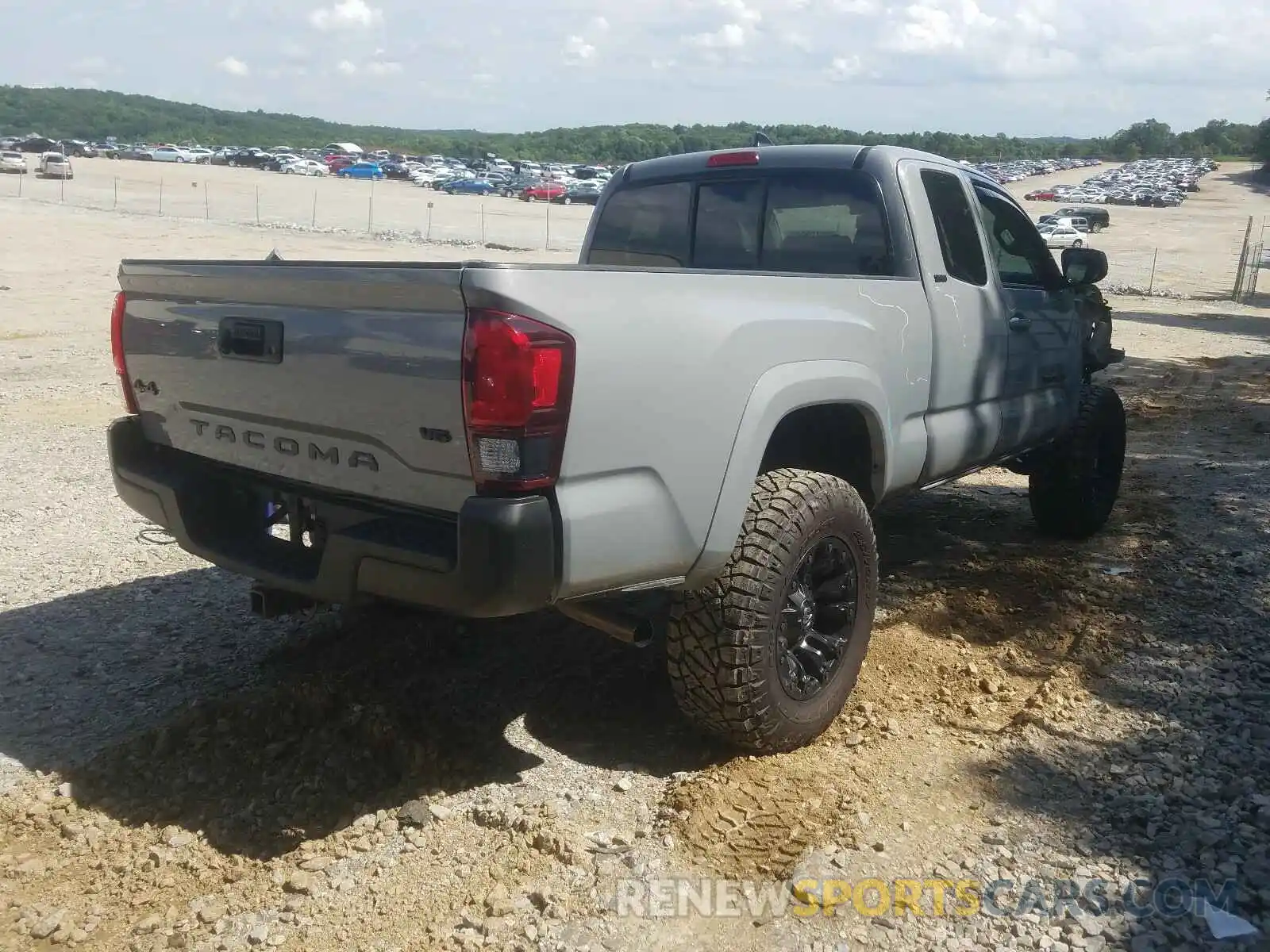 4 Photograph of a damaged car 5TFSZ5AN7KX170940 TOYOTA TACOMA 2019