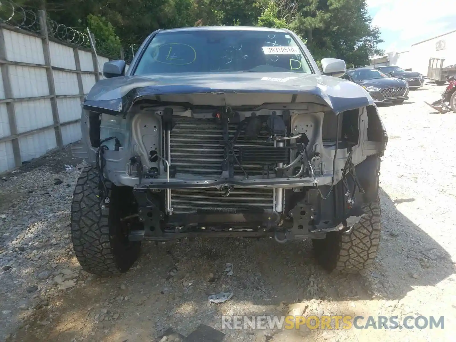 9 Photograph of a damaged car 5TFSZ5AN7KX170940 TOYOTA TACOMA 2019