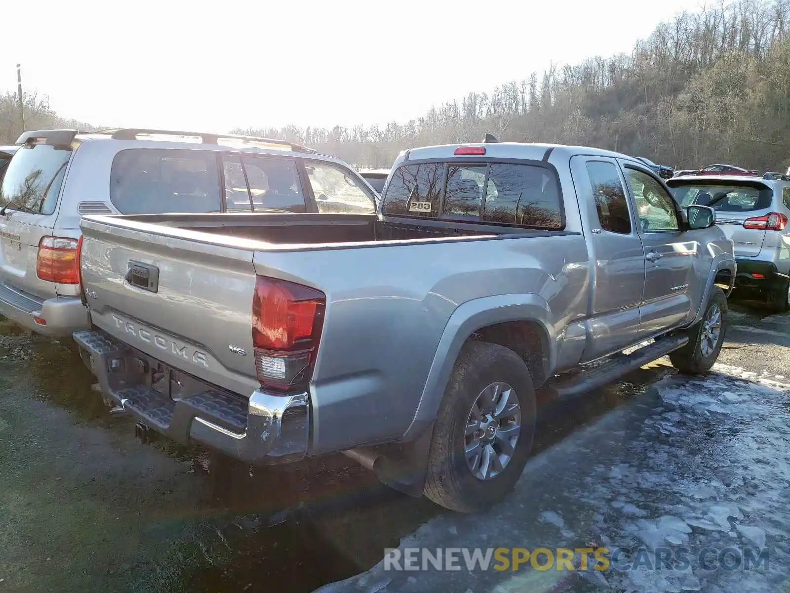 4 Photograph of a damaged car 5TFSZ5AN7KX179878 TOYOTA TACOMA 2019