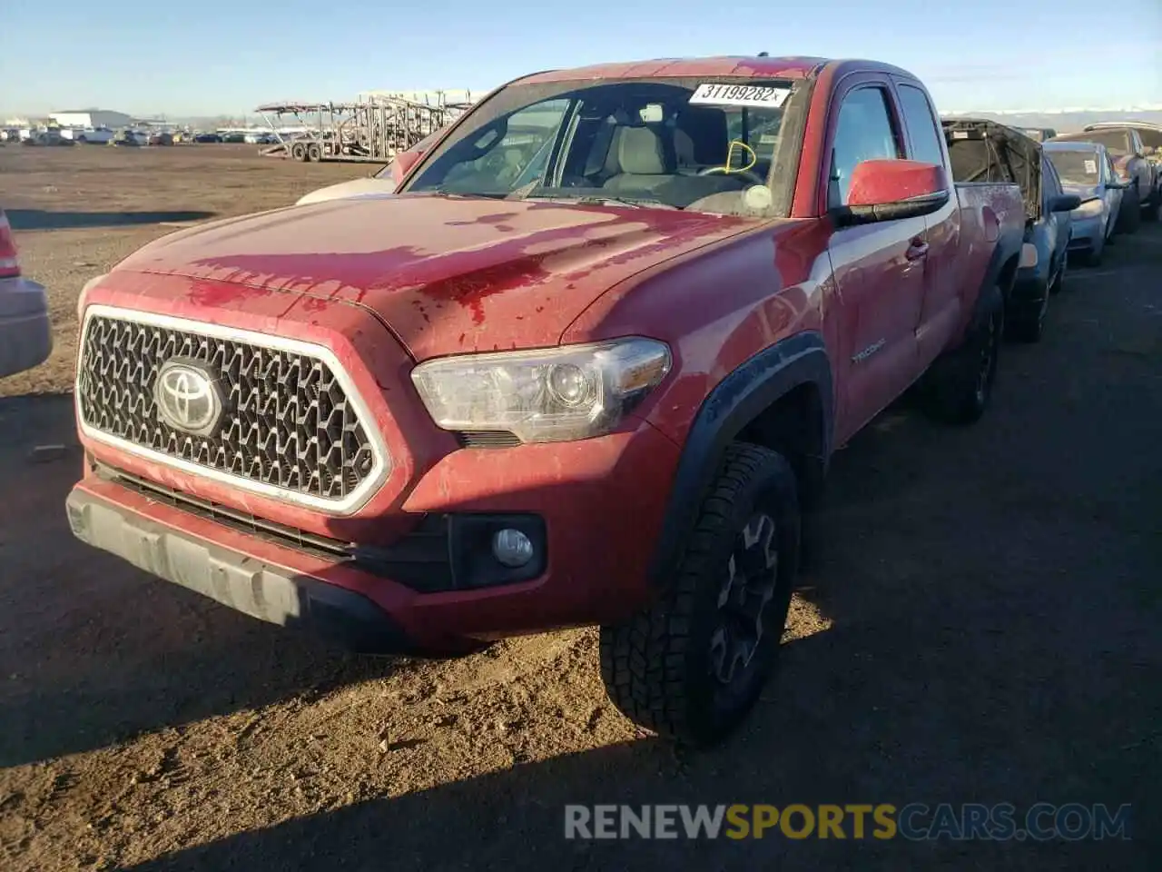 2 Photograph of a damaged car 5TFSZ5AN7KX182621 TOYOTA TACOMA 2019