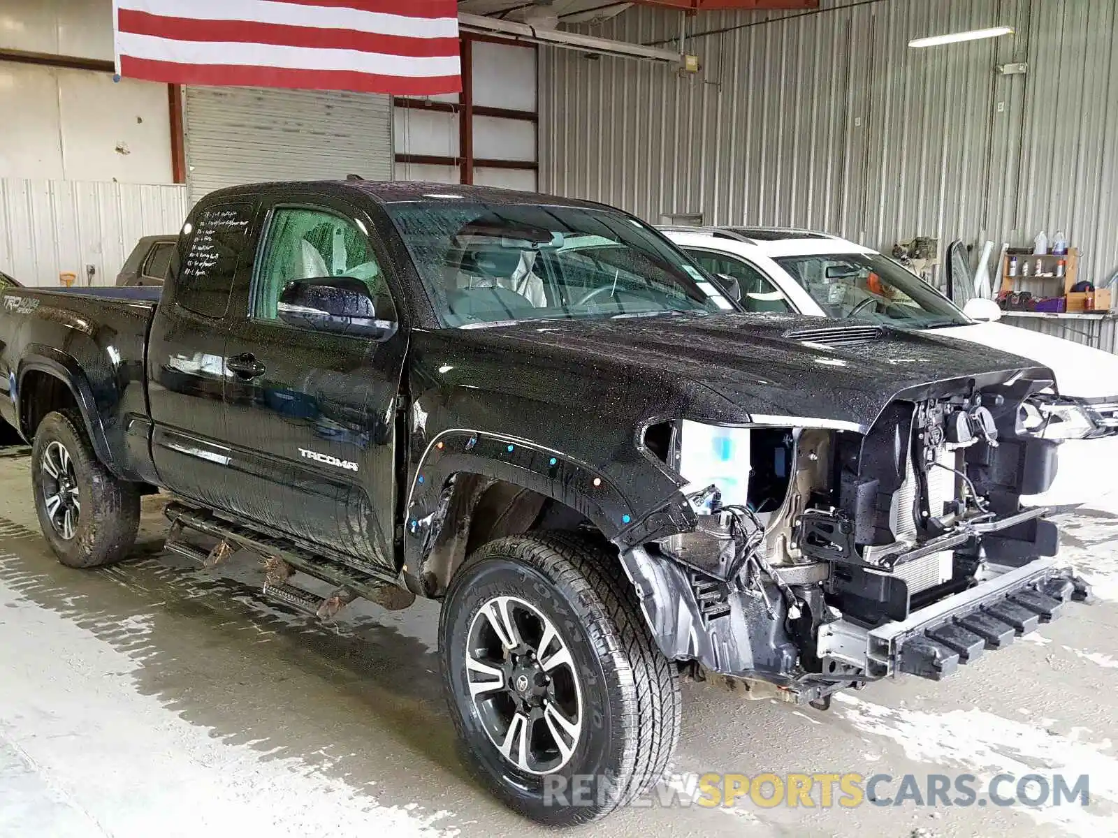 1 Photograph of a damaged car 5TFSZ5AN7KX185762 TOYOTA TACOMA 2019