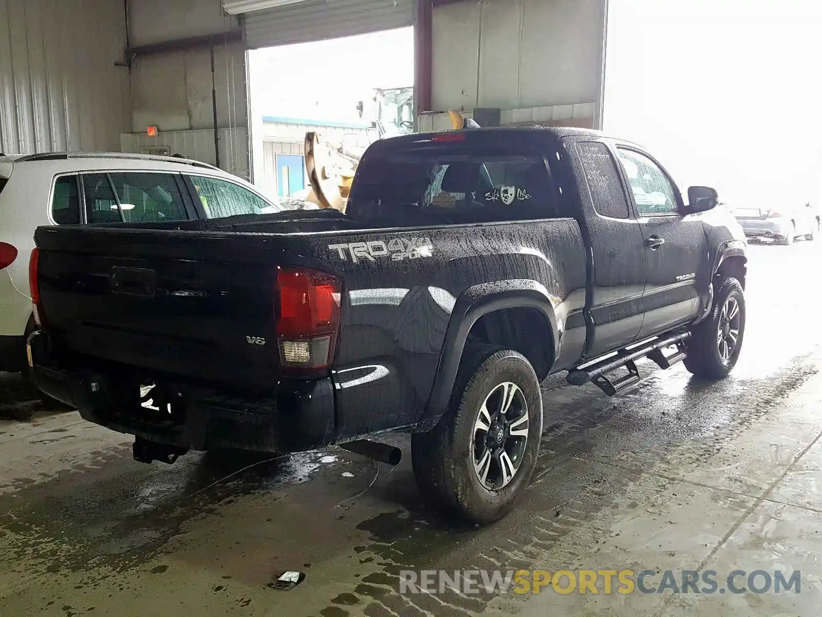 4 Photograph of a damaged car 5TFSZ5AN7KX185762 TOYOTA TACOMA 2019