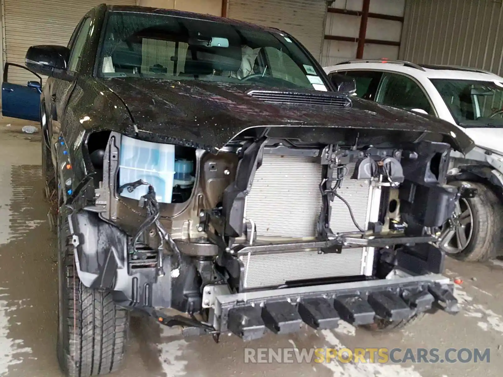 9 Photograph of a damaged car 5TFSZ5AN7KX185762 TOYOTA TACOMA 2019