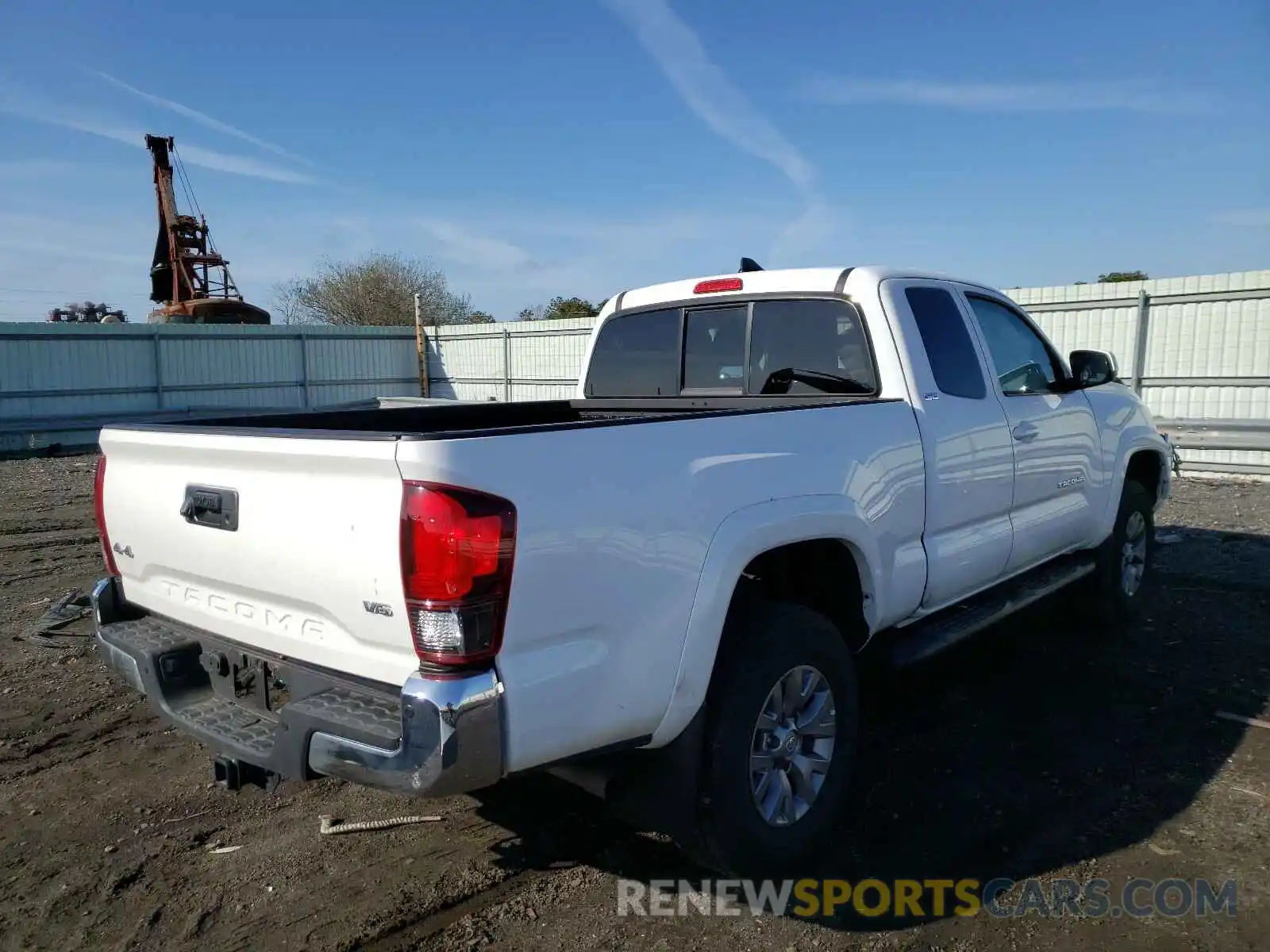 4 Photograph of a damaged car 5TFSZ5AN7KX187852 TOYOTA TACOMA 2019