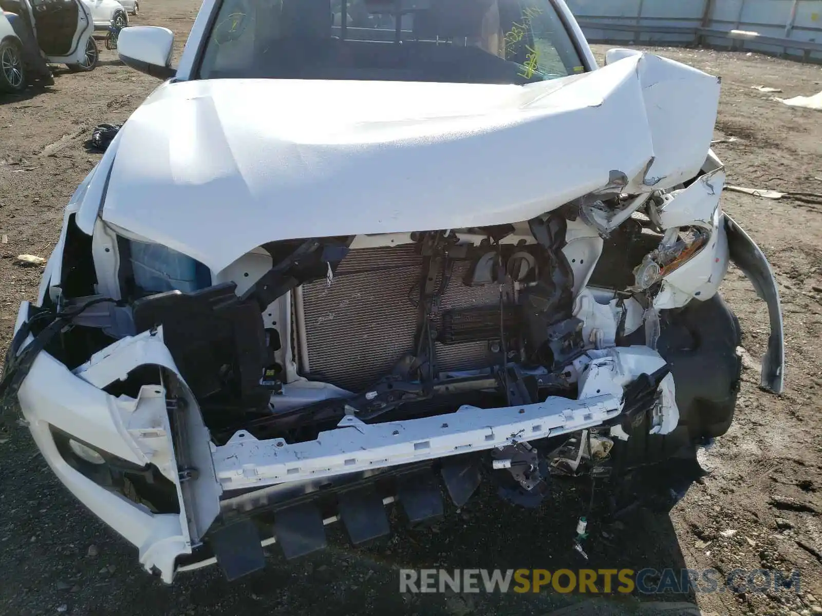 7 Photograph of a damaged car 5TFSZ5AN7KX187852 TOYOTA TACOMA 2019