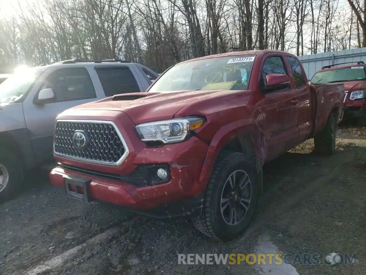 2 Photograph of a damaged car 5TFSZ5AN7KX189665 TOYOTA TACOMA 2019