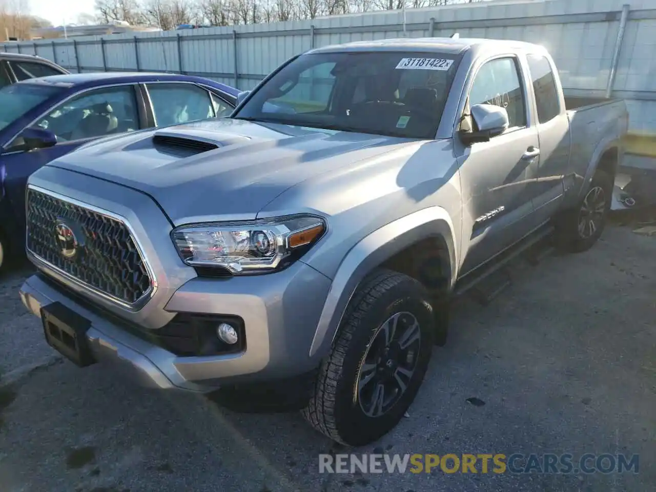 2 Photograph of a damaged car 5TFSZ5AN7KX191710 TOYOTA TACOMA 2019