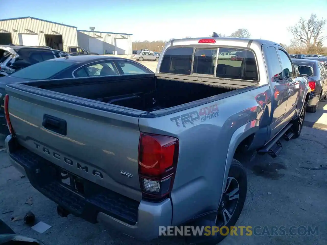 4 Photograph of a damaged car 5TFSZ5AN7KX191710 TOYOTA TACOMA 2019