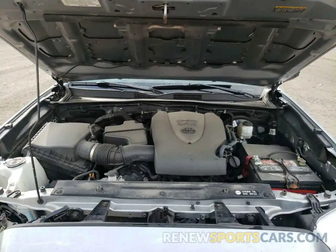 7 Photograph of a damaged car 5TFSZ5AN7KX194249 TOYOTA TACOMA 2019