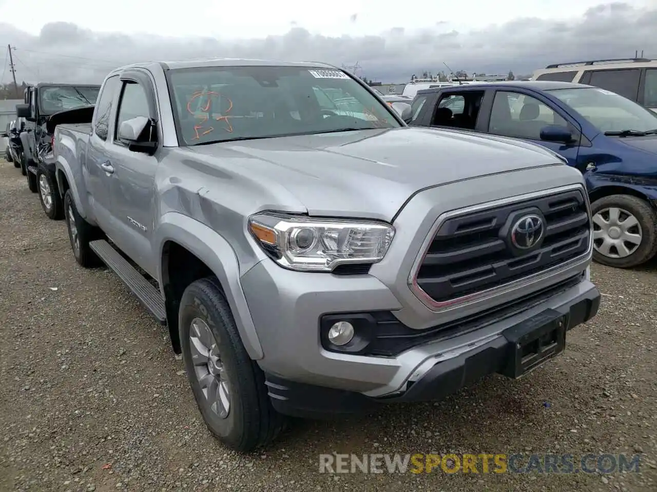 1 Photograph of a damaged car 5TFSZ5AN8KX195782 TOYOTA TACOMA 2019