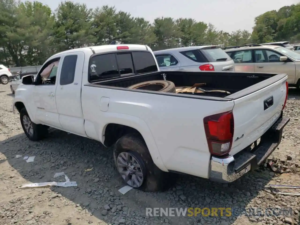 2 Photograph of a damaged car 5TFSZ5AN8KX211981 TOYOTA TACOMA 2019