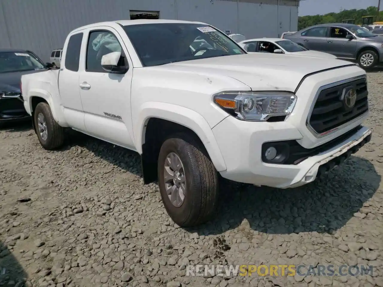 4 Photograph of a damaged car 5TFSZ5AN8KX211981 TOYOTA TACOMA 2019