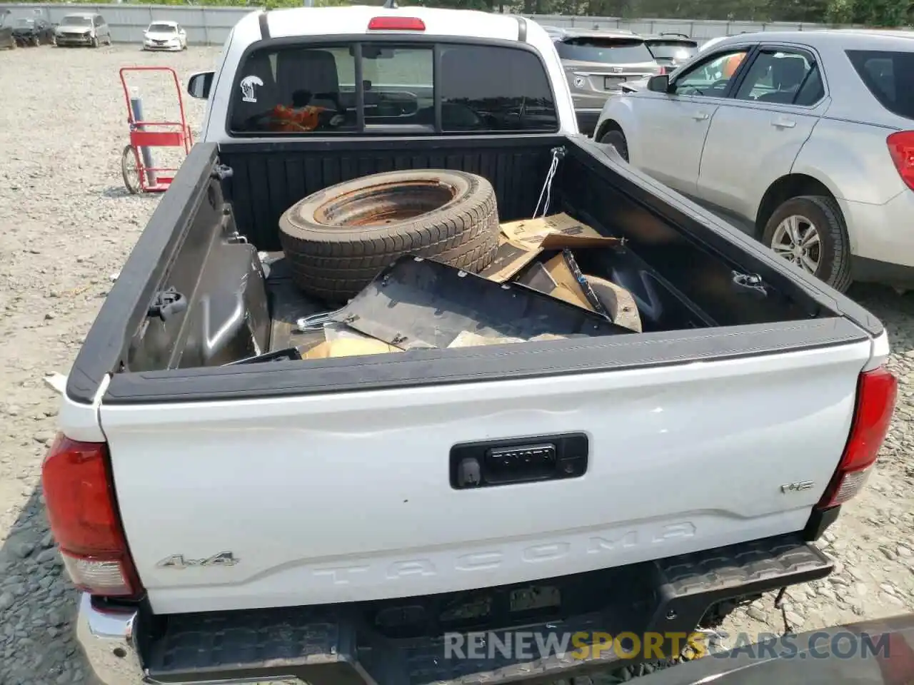 6 Photograph of a damaged car 5TFSZ5AN8KX211981 TOYOTA TACOMA 2019