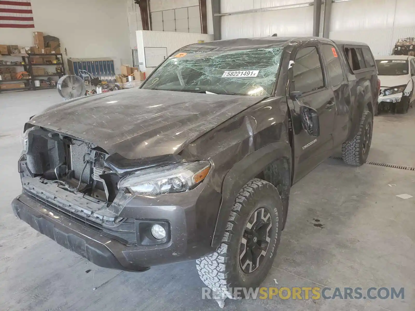 2 Photograph of a damaged car 5TFSZ5AN8KX212192 TOYOTA TACOMA 2019