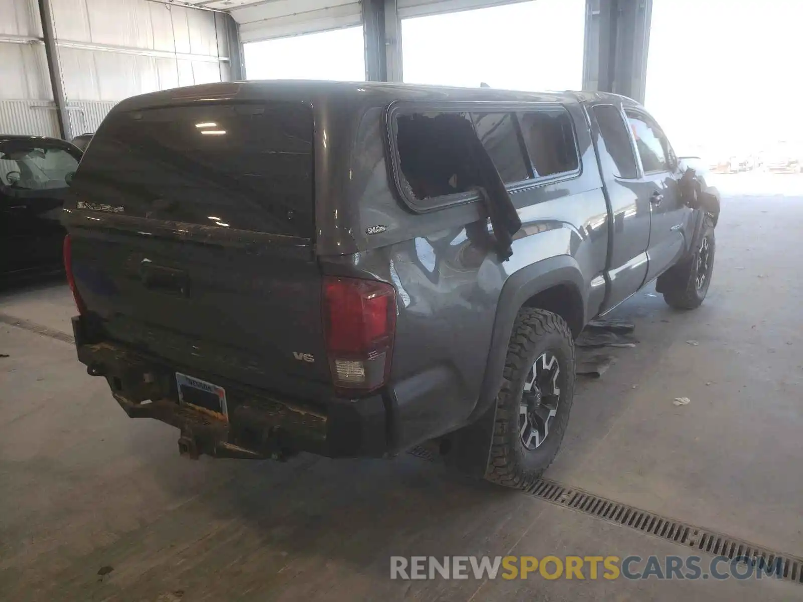 4 Photograph of a damaged car 5TFSZ5AN8KX212192 TOYOTA TACOMA 2019