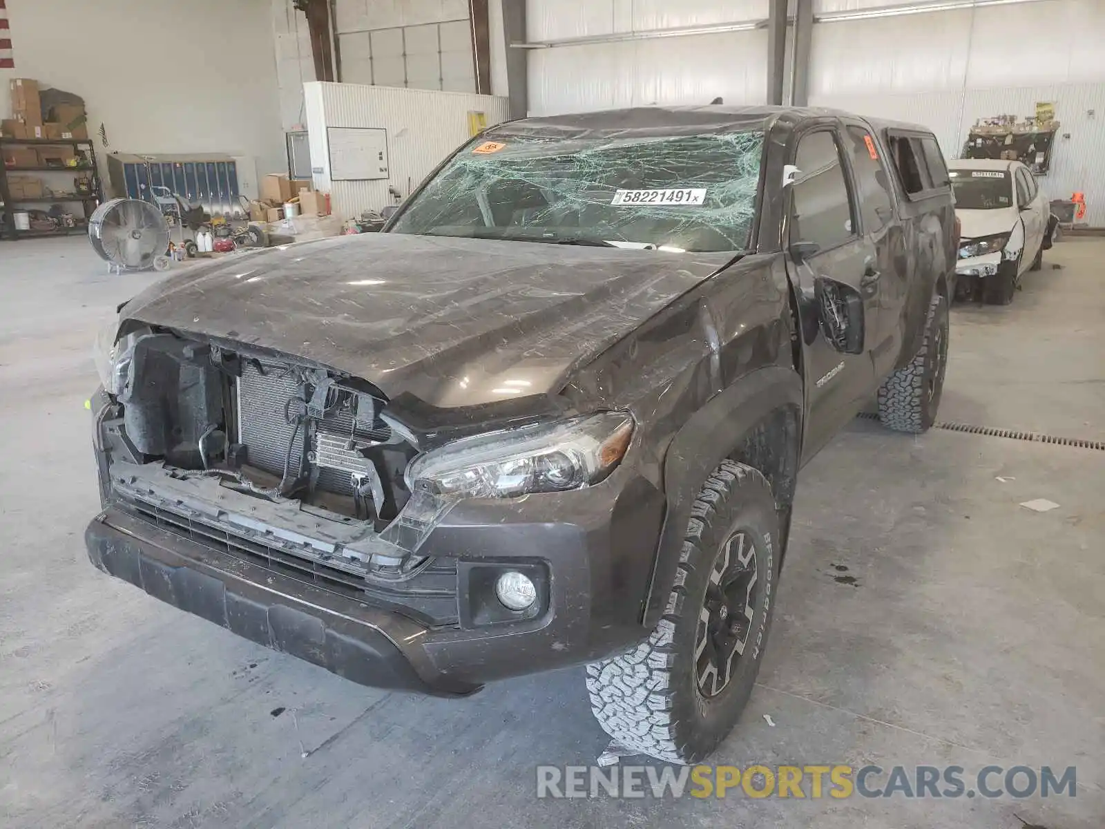 9 Photograph of a damaged car 5TFSZ5AN8KX212192 TOYOTA TACOMA 2019