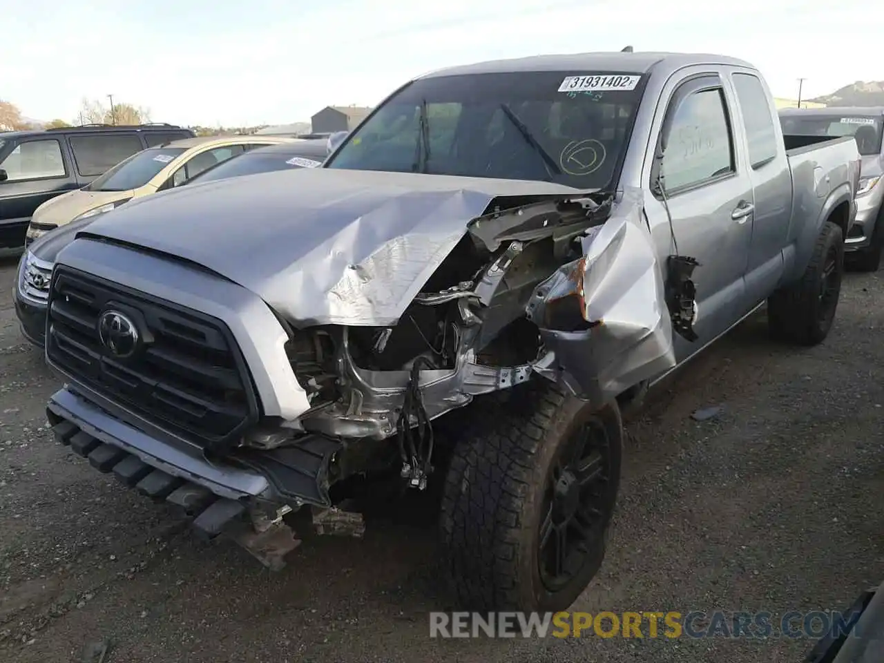 2 Photograph of a damaged car 5TFSZ5AN9KX175086 TOYOTA TACOMA 2019